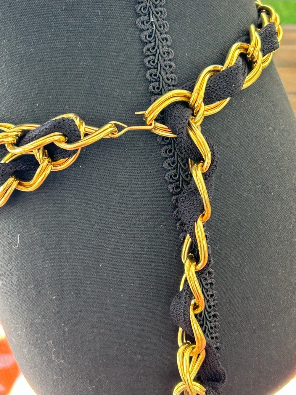 Couture style chunky gold tone and black textile woven chain belt